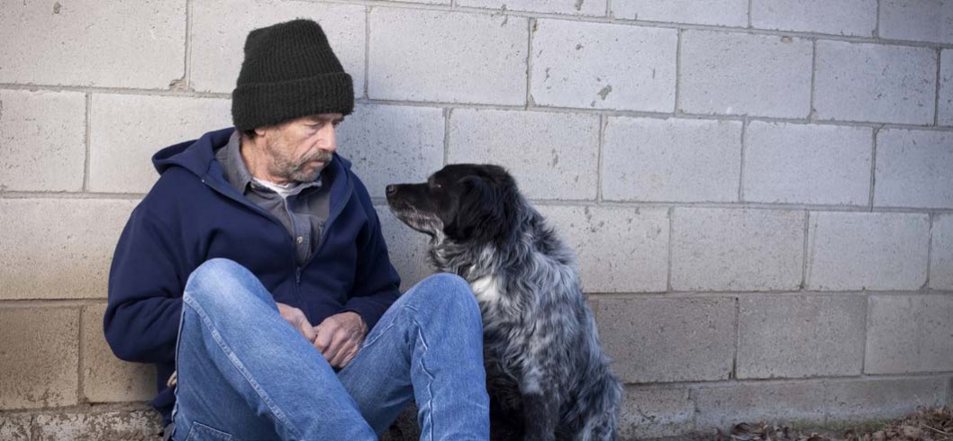 Homeless person with dog